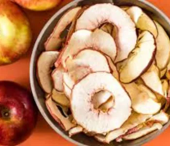 Naturally dried apple products processed using solar technology for enhanced shelf life
