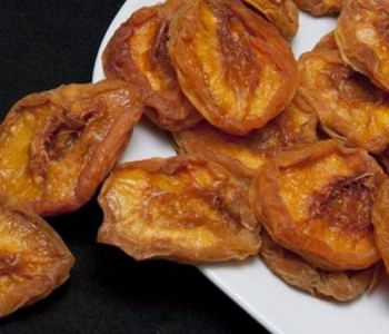 Peach slices dried using solar dryer in Punjab
