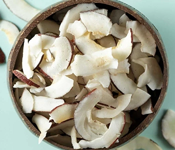 Solar dried coconut processed using RSFP solar dryers to retain quality, freshness, and longer shelf life.