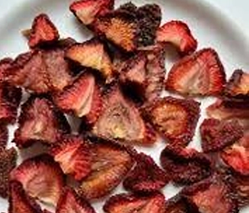 Naturally sun dried strawberries processed for healthy snacks and food industry use